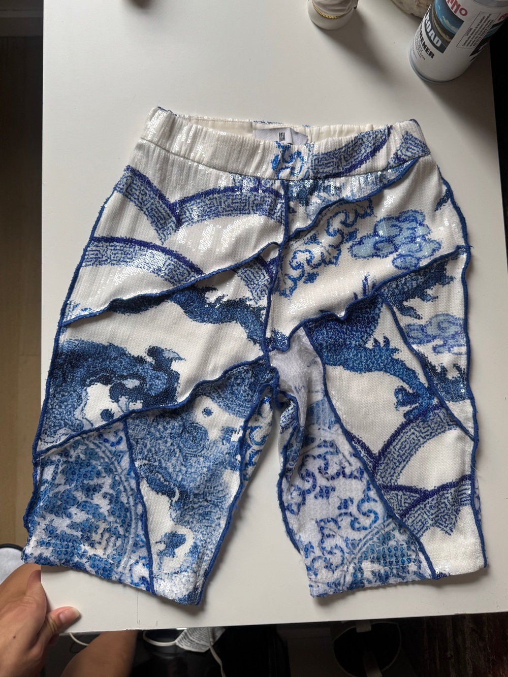 ASAI Takeaway blue and white dragon print sequin shorts